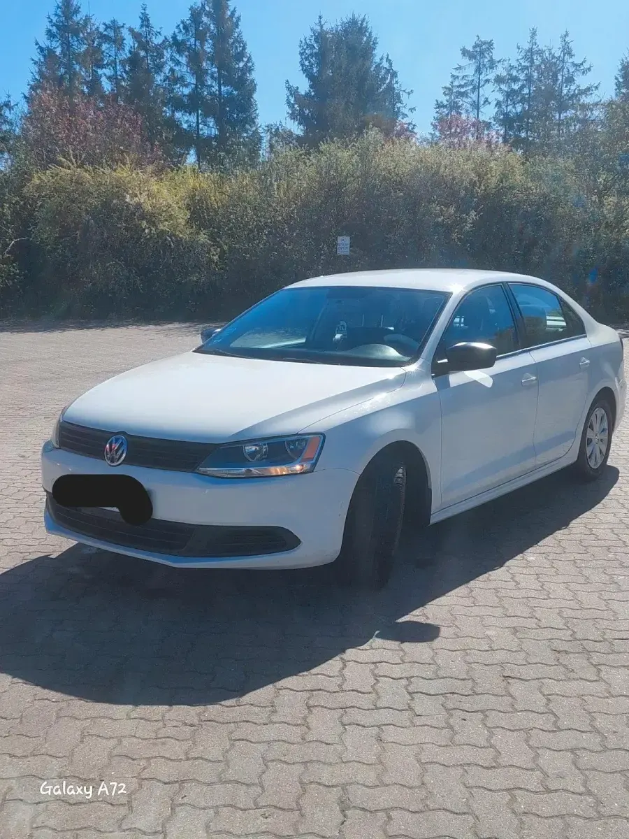 Używany VW Jetta 122 KM (89 kW) 2012 Biały Sedan/Limuzyna