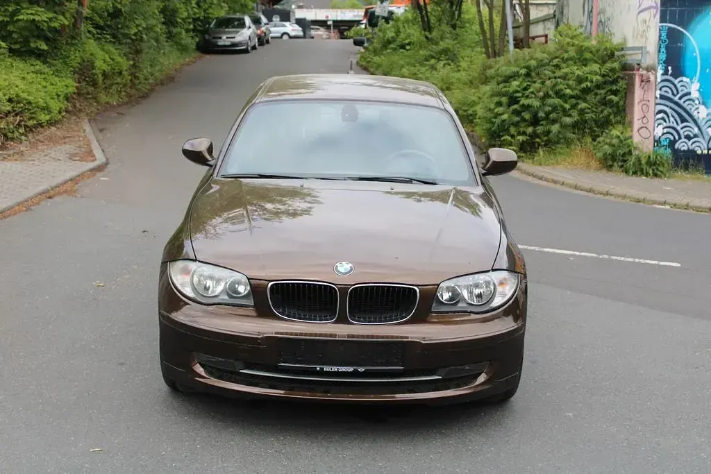 Używany BMW 116 122 KM (89 kW) 2011 Brązowy Hatchback