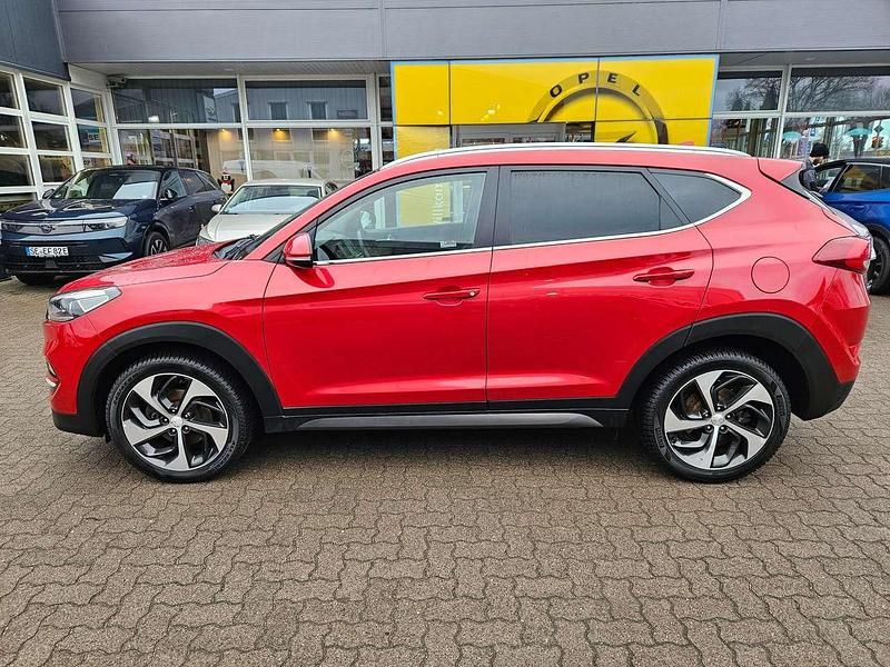 Ultimate red / mic (metallic) Gebraucht 2017 Hyundai Tucson Style SUV | 16.490 € (Fairer Preis) - Bild 1/4