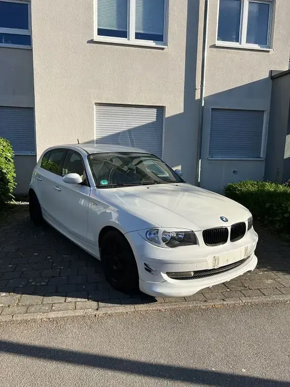 Second-hand BMW 116 Performance 122 CP (89 kW) 2009 Alb Hatchback