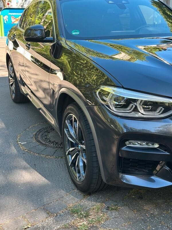 Grau Gebraucht 2018 BMW X4 Performance SUV | 28.900 € (Teuer) - Bild 1/4
