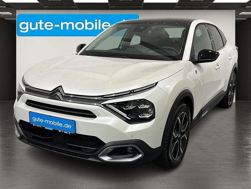 Weiß Gebraucht 2023 Citroën e-C4 Shine Limousine | 23.990 € (Teuer) - Bild 1/4