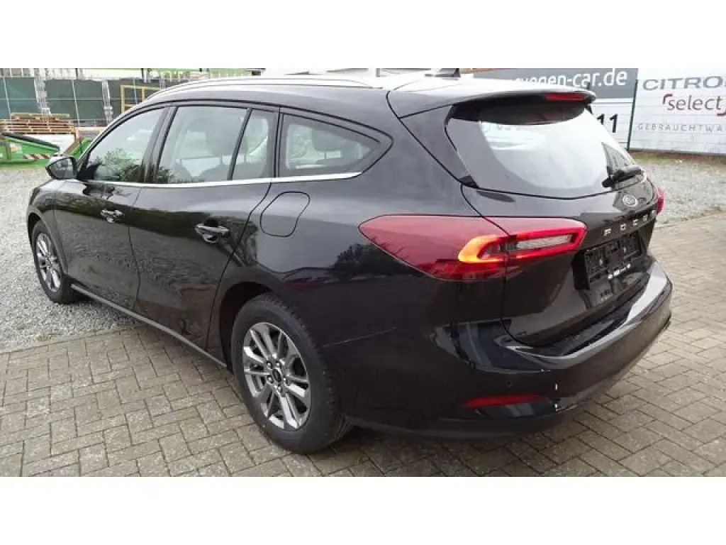 Gebraucht Ford Focus Titanium 125 PS (91 kW) 2023 Agate black metallic (metallic) Kombi