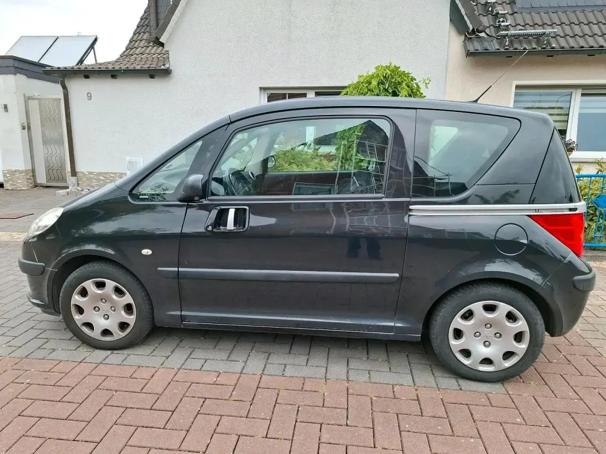 Gebraucht Peugeot 1007 72 PS (52 kW) 2005 Schwarz Van / Kleinbus