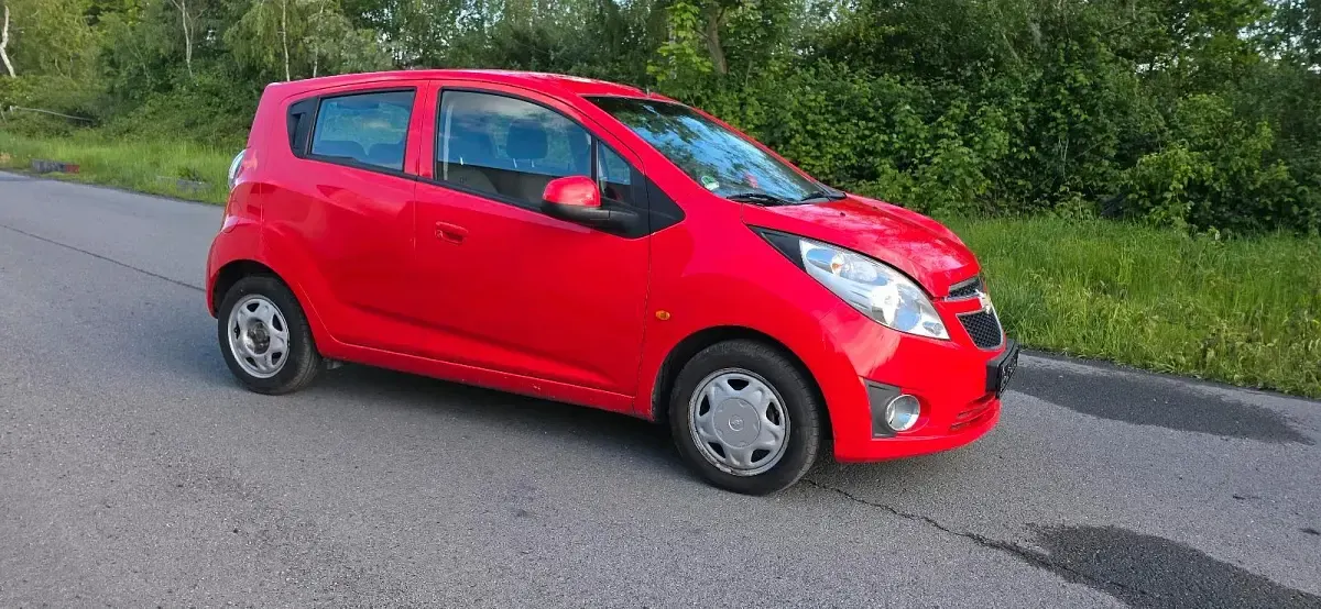 Usado Chevrolet Spark 68 HP (50 kW) 2010 Vermelho Citadino