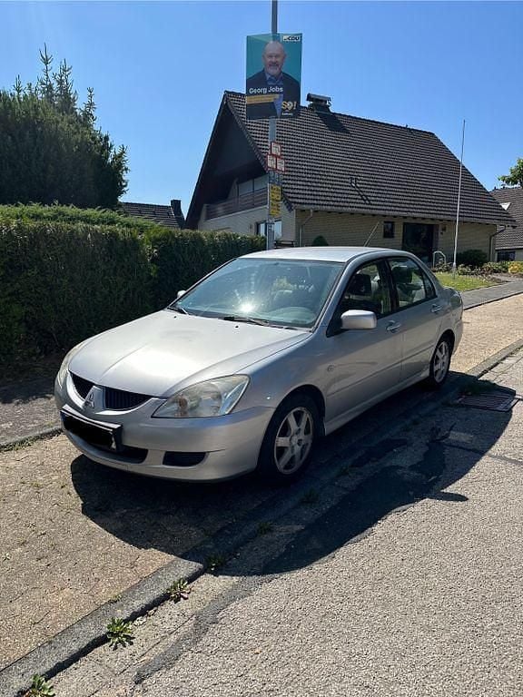 Silber Gebraucht 2004 Mitsubishi Lancer Comfort Edition Limousine | 1.700 € (Fairer Preis) - Bild 1/4