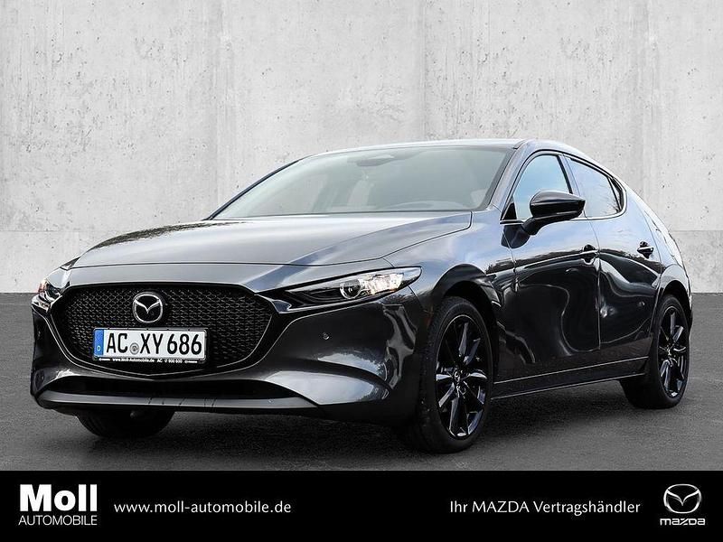 Grau Gebraucht 2024 Mazda 3 Homura-Line Limousine | 25.480 € (Fairer Preis) - Bild 1/4