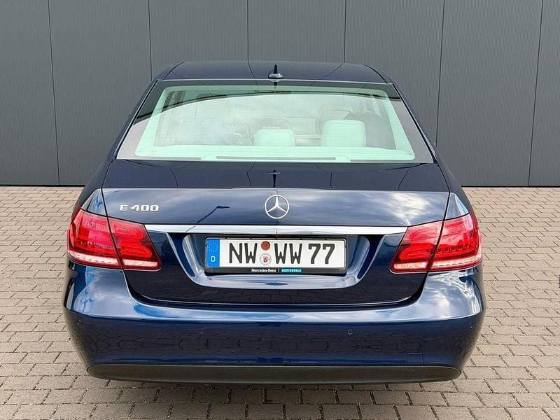 Second-hand Mercedes E400 333 CP (244 kW) 2014 Albastru Berlinǎ