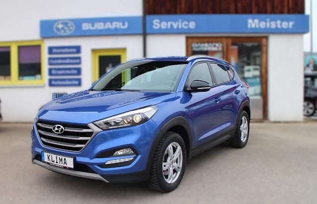Champion blue / met Gebraucht 2018 Hyundai Tucson Passion SUV | 15.990 € (Fairer Preis) - Bild 1/4