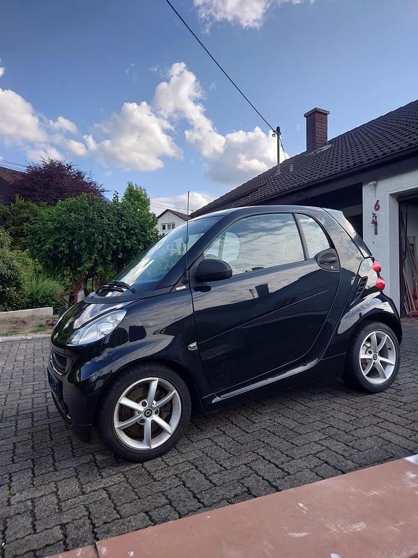 Schwarz Gebraucht 2010 Smart ForTwo Coupé Kleinwagen | 3.999 € - Bild 1/4