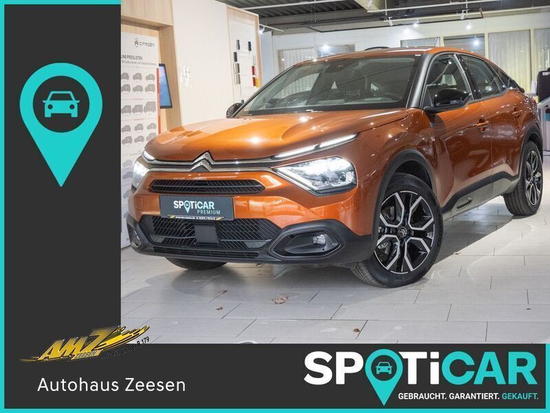 Karamell braun (metallic) Gebraucht 2022 Citroën e-C4 Feel Limousine | 17.440 € (Superpreis) - Bild 1/4