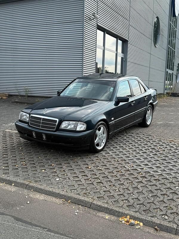 Schwarz Gebraucht 1998 Mercedes C220 AMG Limousine | 4.900 € - Bild 1/4