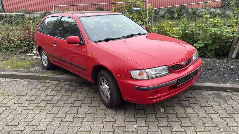 Rot Gebraucht 1998 Nissan Almera Kleinwagen | 1.700 € - Bild 1/4