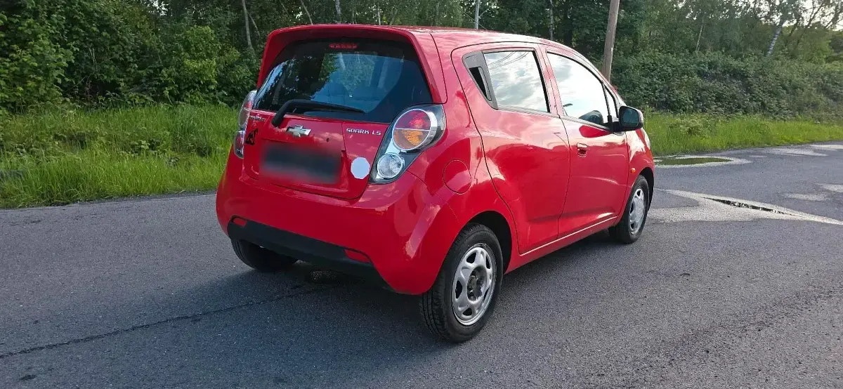 Usado Chevrolet Spark 68 HP (50 kW) 2010 Vermelho Citadino