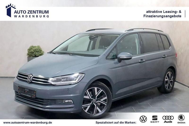 Delfingrau metallic Gebraucht 2024 VW Touran Van / Kleinbus | 29.450 € (Fairer Preis) - Bild 1/4