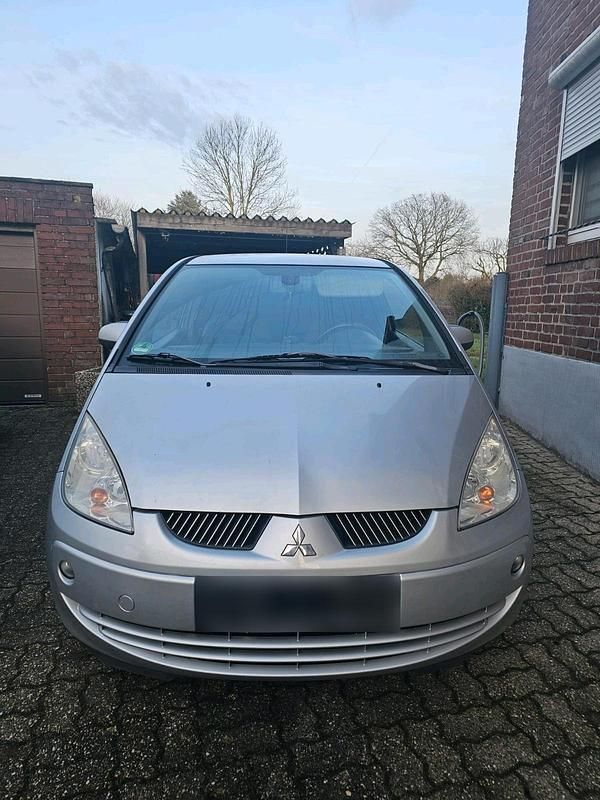 Second-hand Mitsubishi Colt 75 CP (55 kW) 2007 Argintiu Hatchback
