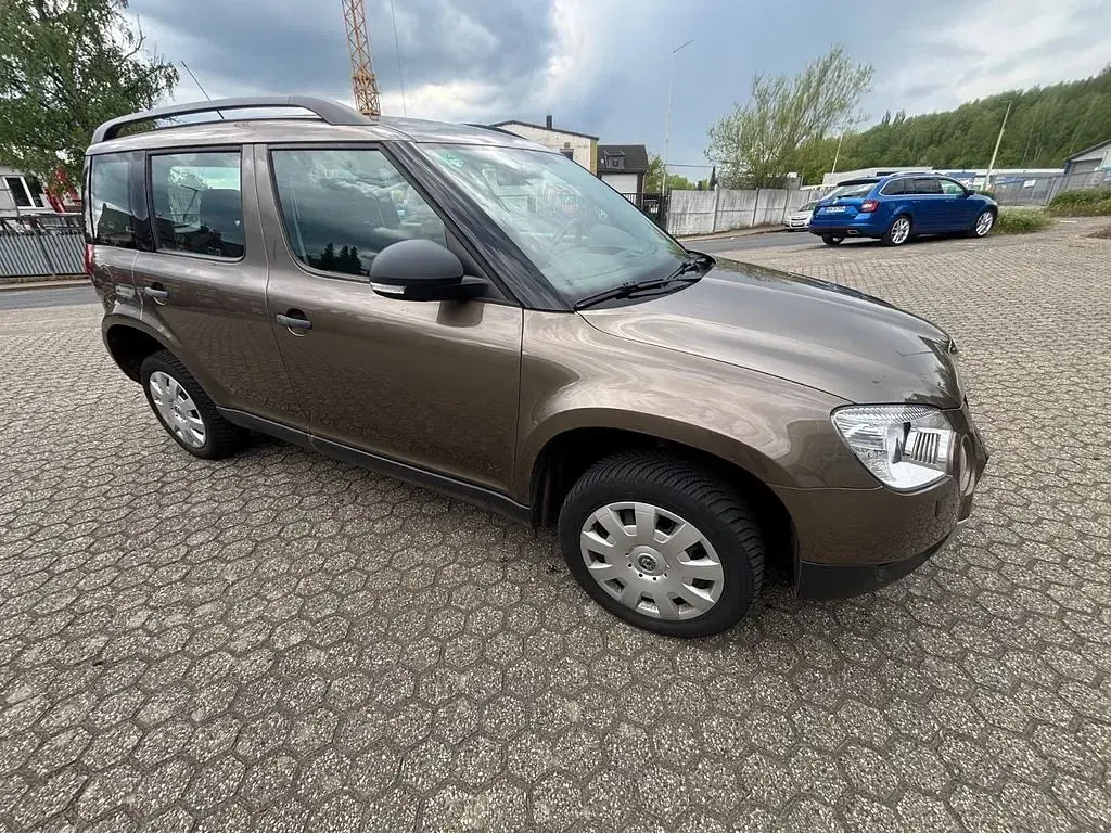 Używany Skoda Yeti 105 KM (77 kW) 2011 Brązowy SUV