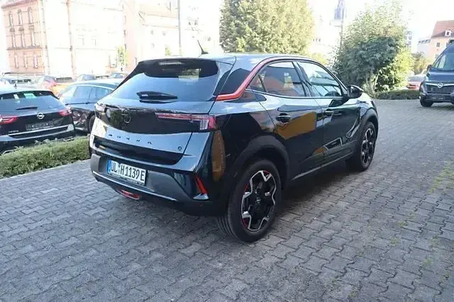 Gebraucht Opel Mokka-e Ultimate 100 kW (136 PS) 2023 Grün metallic SUV