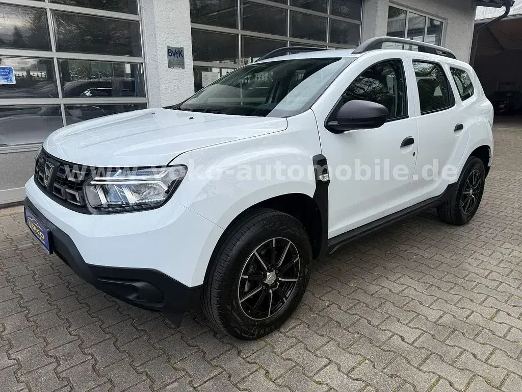 Używany Dacia Duster Acces 91 KM (66 kW) 2021 Biały SUV