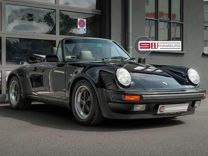 Uni schwarz a1 Gebraucht 1989 Porsche 911 Cabrio | 99.900 € - Bild 1/4
