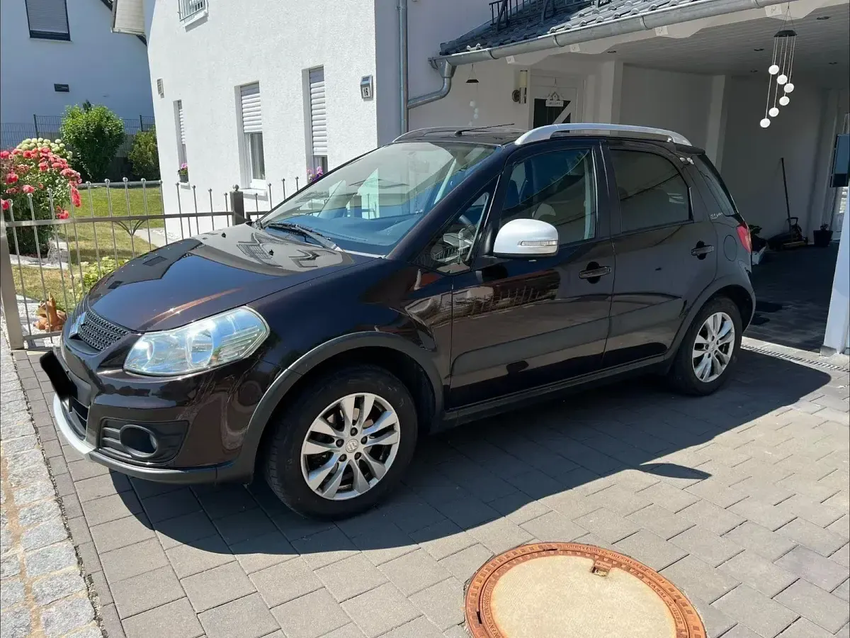 Gebraucht Suzuki SX4 Comfort 120 PS (88 kW) 2013 Braun Limousine