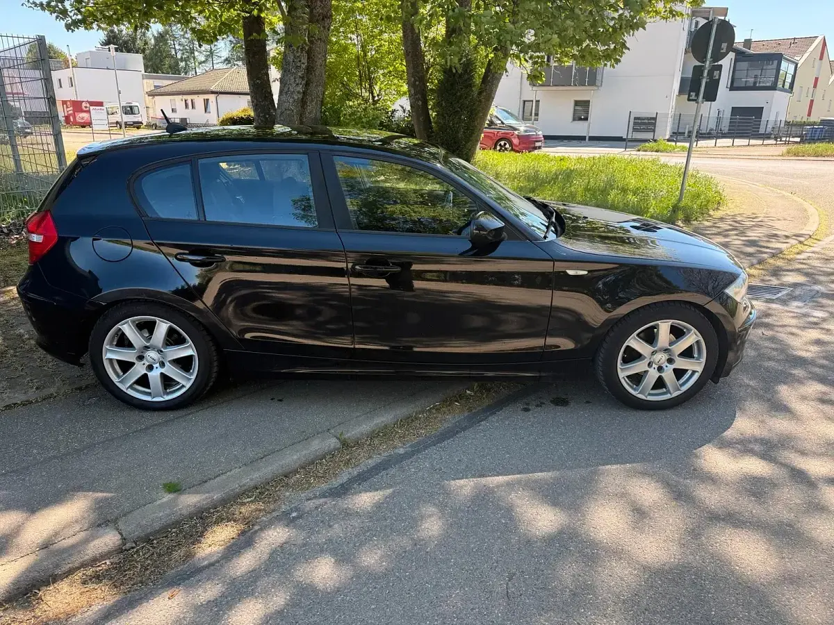 Używany BMW 116 116 KM (85 kW) 2011 Czarny Hatchback