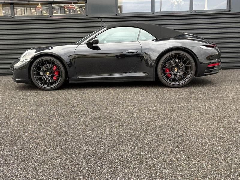 Schwarz Gebraucht 2024 Porsche 911 Carrera 4S Cabriolet Chrono Cabrio | 145.780 € (Superpreis) - Bild 1/4