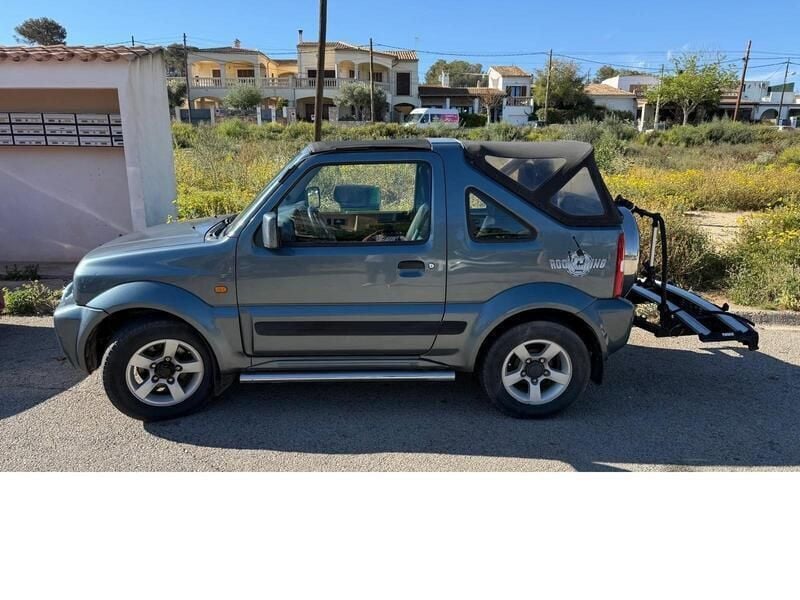 Grau Gebraucht 2009 Suzuki Jimny SUV | 10.990 € (Teuer) - Bild 1/4