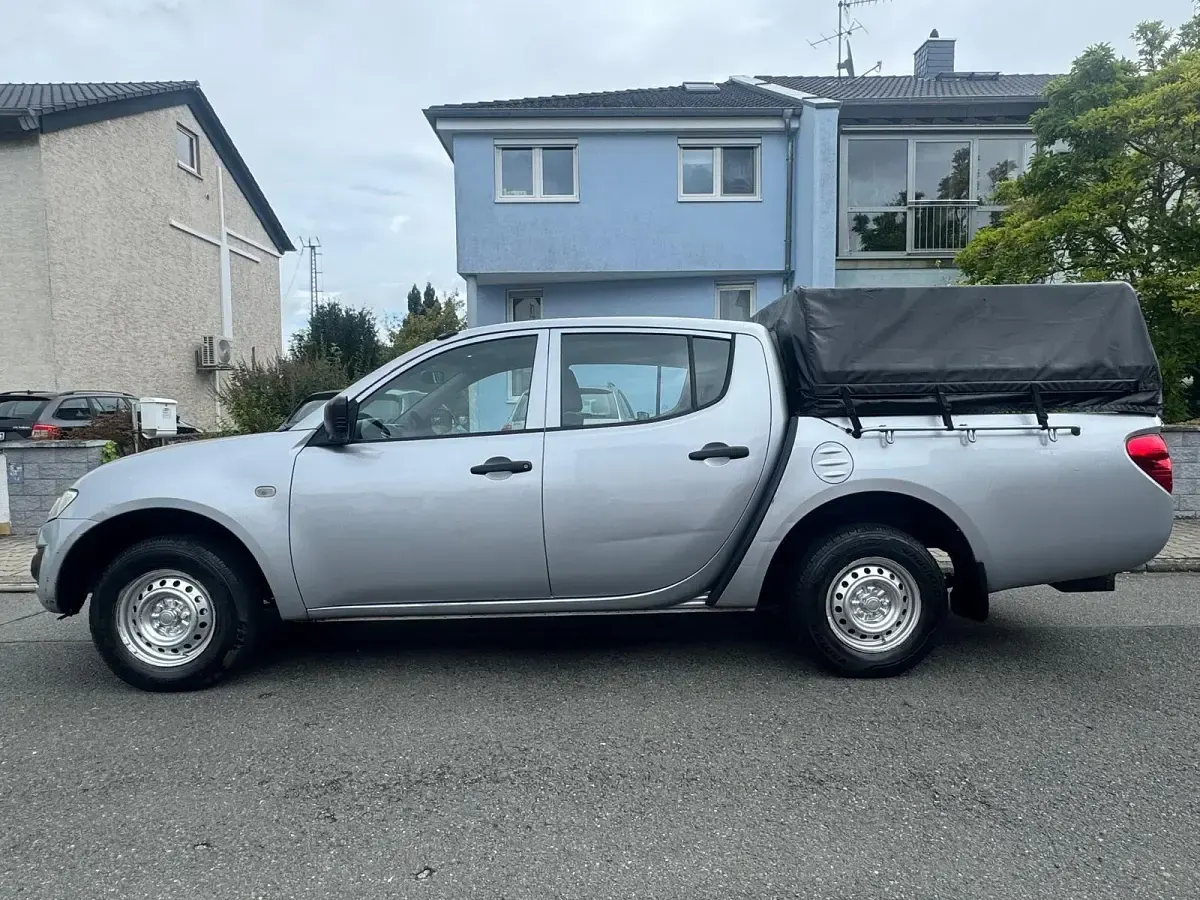 Używany Mitsubishi L200 127 KM (93 kW) 2012 Srebrny Pickup