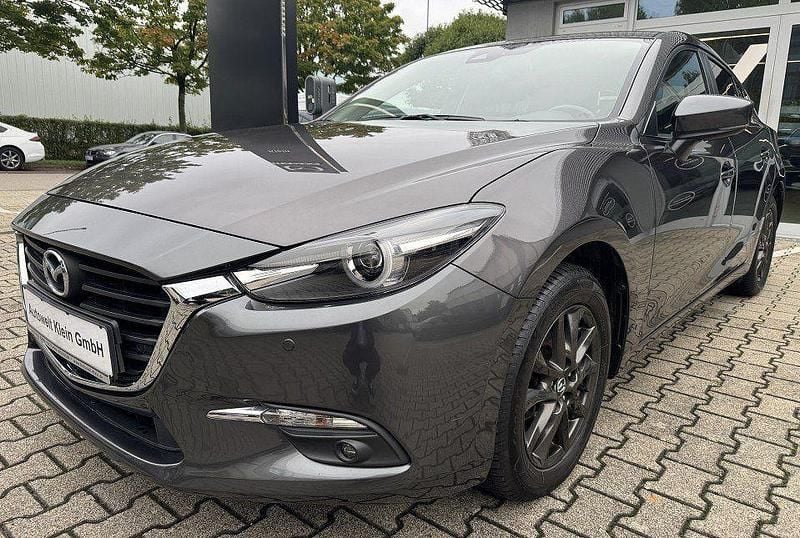 Grau Gebraucht 2018 Mazda 3 Exclusive Limousine | 14.850 € (Fairer Preis) - Bild 1/4