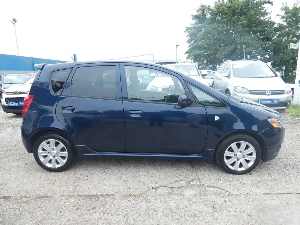 Gebraucht Mitsubishi Colt Motion 95 PS (69 kW) 2012 Blau Kleinwagen