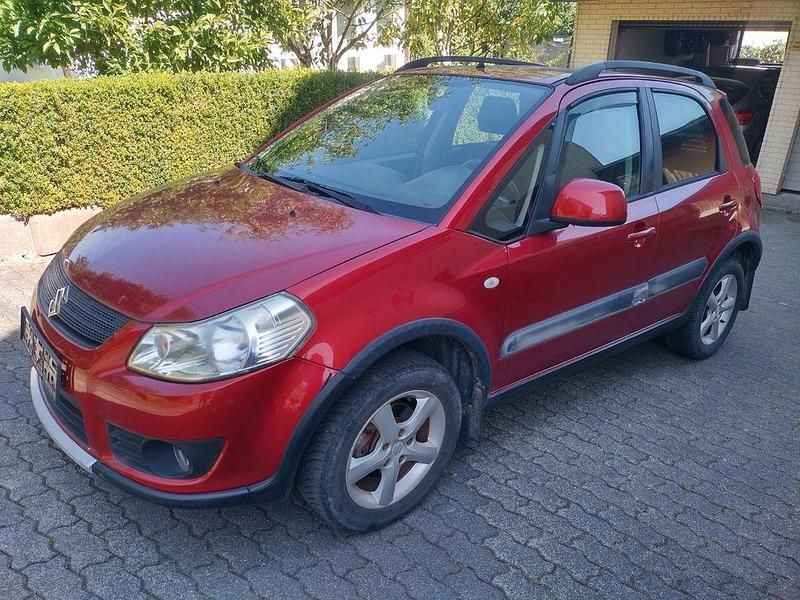 Rot Gebraucht 2007 Suzuki SX4 Limousine | 2.050 € - Bild 1/4