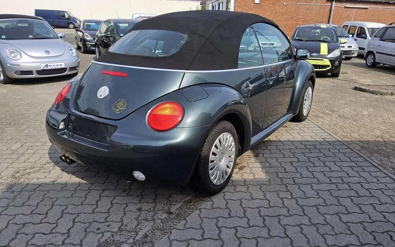Grün (alaskagrün metallic / schwarz) Gebraucht 2003 VW Beetle Highline Cabrio | 1.998 € (Superpreis) - Bild 1/4