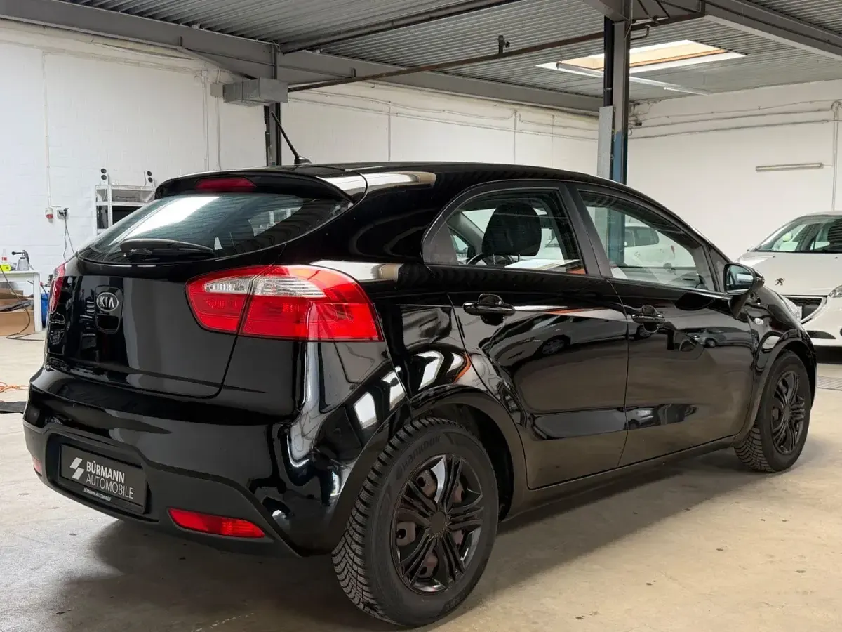 Gebraucht Kia Rio Edition 7 109 PS (80 kW) 2011 Schwarz Kleinwagen