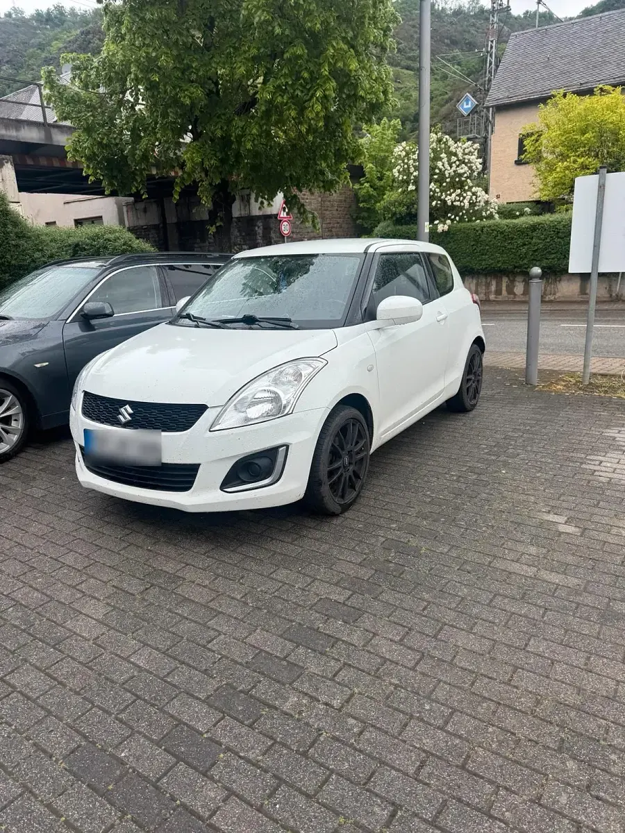 Gebraucht Suzuki Swift 94 PS (69 kW) 2014 Weiß Kleinwagen