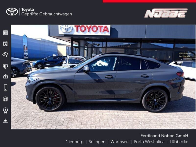 Dravitgrau metallic Gebraucht 2022 BMW X6 M Sport SUV | 77.990 € - Bild 1/4