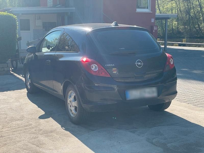 Używany Opel Corsa 90 KM (66 kW) 2009 Czarny Hatchback