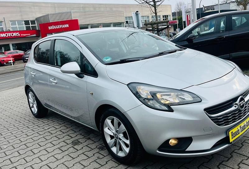 Gebraucht Opel Corsa drive 90 PS (66 kW) 2015 Silber Kleinwagen