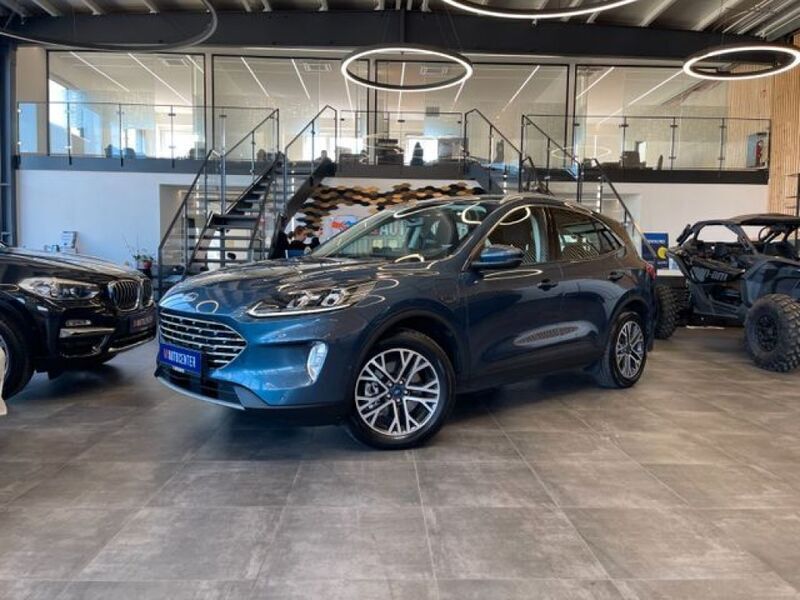 Chromablau metallic (metallic) Gebraucht 2021 Ford Kuga Titanium SUV | 20.499 € (Superpreis) - Bild 1/4