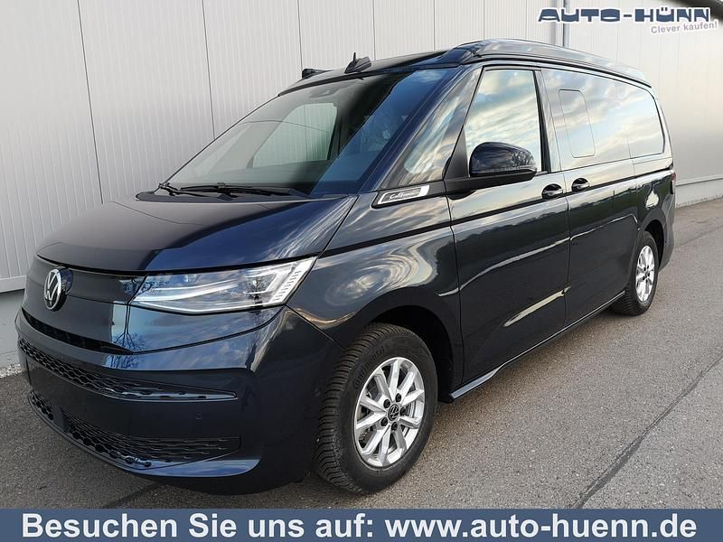 Reflexsilber metallic dach schwarz Gebraucht 2024 VW T7 Comfortline Van | 61.935 € - Bild 1/4