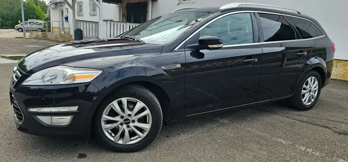 Gebraucht Ford Mondeo Titanium 200 PS (147 kW) 2011 Pantherschwarz metallic Kombi