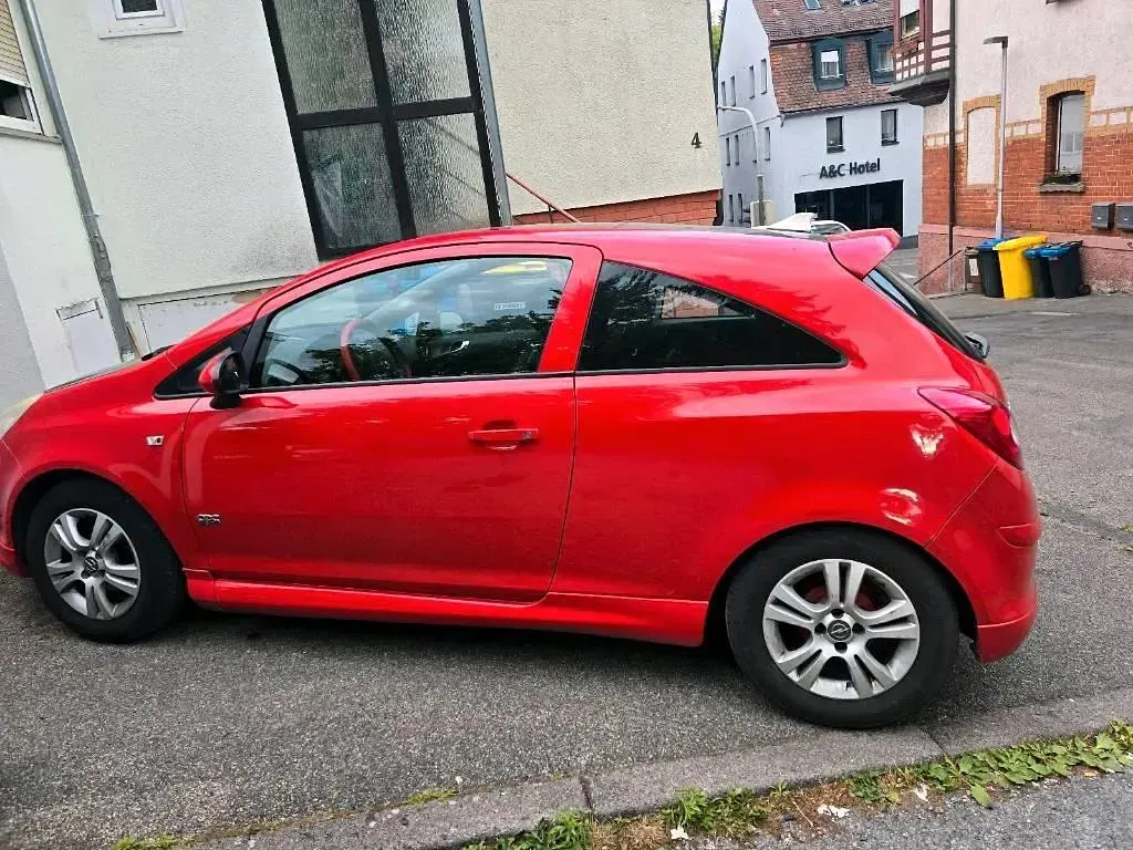 Gebraucht Opel Corsa 90 PS (66 kW) 2009 Rot Kleinwagen