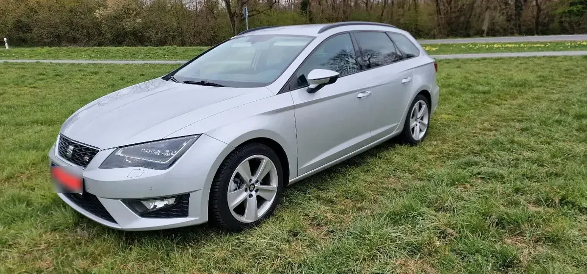 Używany Seat Leon 184 KM (135 kW) 2014 Pomarańczowy Kombi