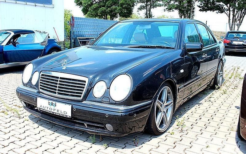 Schwarz Gebraucht 1998 Mercedes E55 AMG AMG Limousine | 11.950 € - Bild 1/4