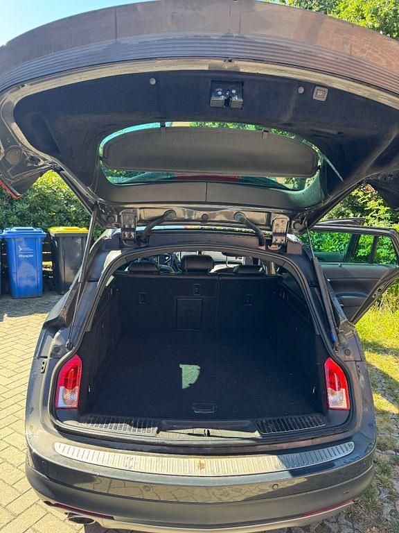 Grau Gebraucht 2015 Opel Insignia Country Tourer Eco Kombi | 10.200 € (Fairer Preis) - Bild 1/4