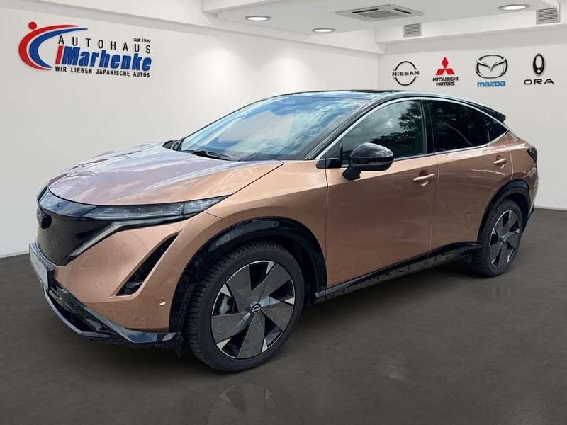 Bronze metallic Gebraucht 2024 Nissan Ariya Evolve SUV | 39.990 € (Etwas zu teuer) - Bild 1/4