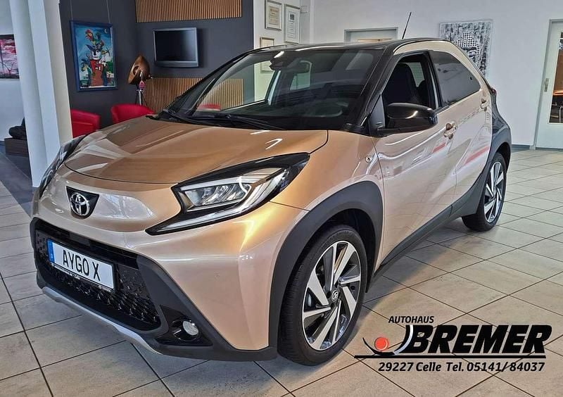 Ginger beige Gebraucht 2022 Toyota Aygo X X-plore SUV | 15.750 € (Fairer Preis) - Bild 1/4
