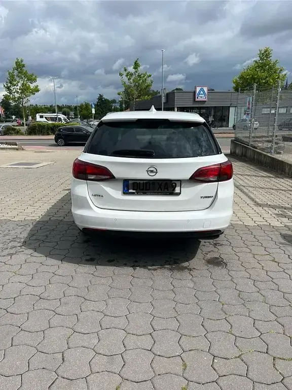 Gebraucht Opel Astra Active 125 PS (91 kW) 2017 Weiß Kombi
