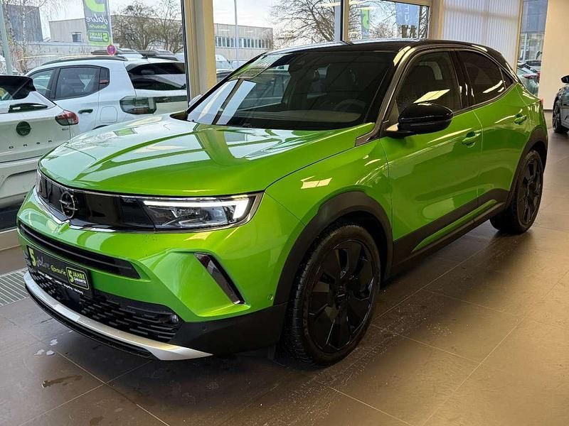 Gebraucht Opel Mokka Ultimate 131 PS (96 kW) 2023 Matcha green metallic SUV