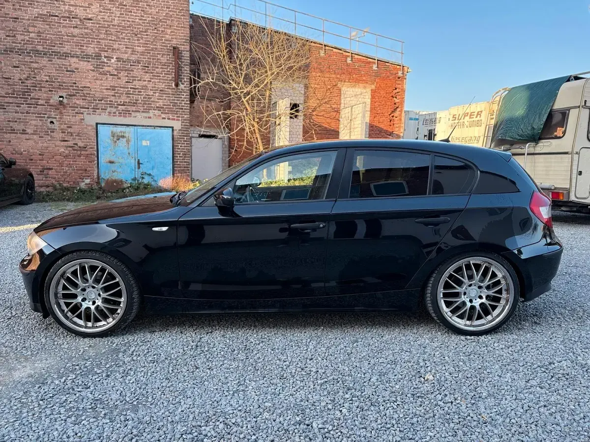 Używany BMW 116 115 KM (84 kW) 2006 Czarny Hatchback